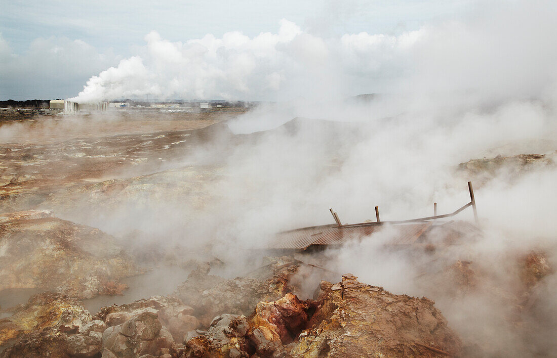 Gunnuhver geothermal field, with a geothermal plant behind, Iceland.; Reykjanesviti, Reykjanes peninsula, Iceland. 