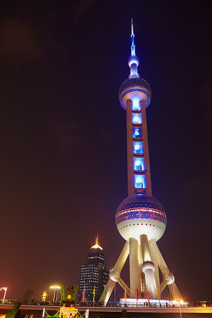 A tower at night, Lujiazui, Pudong, Shanghai, China.; Pudong, Shanghai, China.