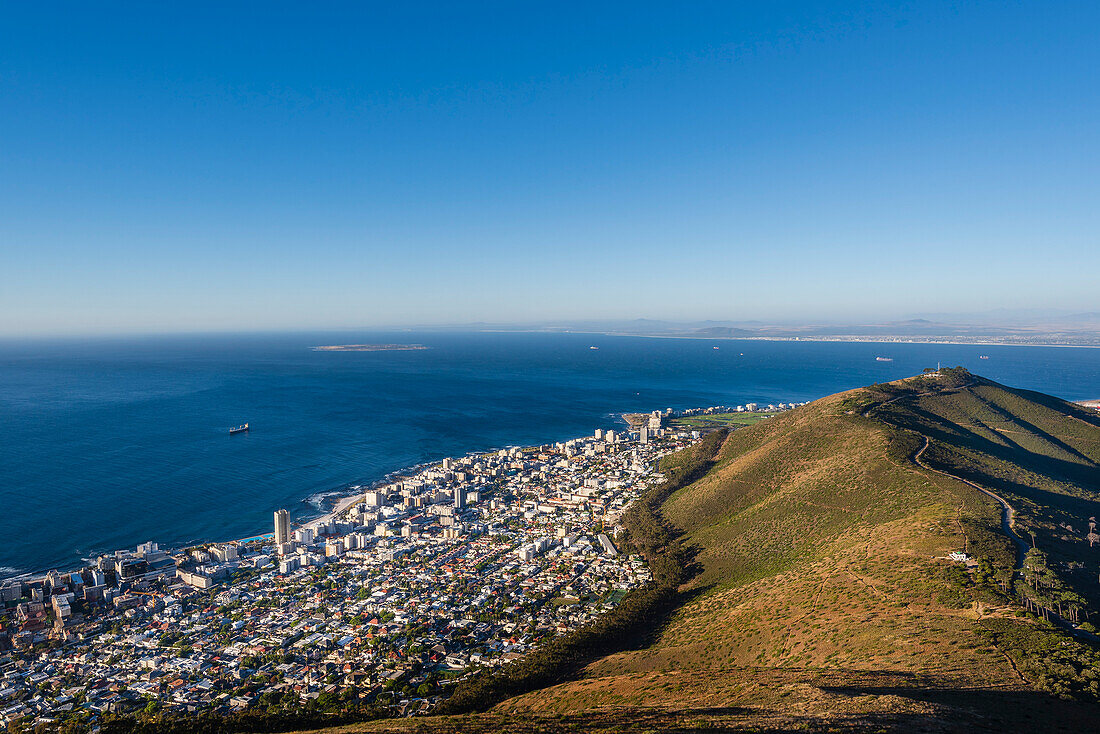 Overview of Cape Town city skyline and shoreline along the Atlantic Ocean coast from the top of Signal Hill; Cape Town, Western Cape Province, South Africa