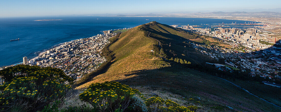 Overview of Cape Town city skyline and shoreline along the Atlantic Ocean coast from the top of Signal Hill; Cape Town, Western Cape Province, South Africa