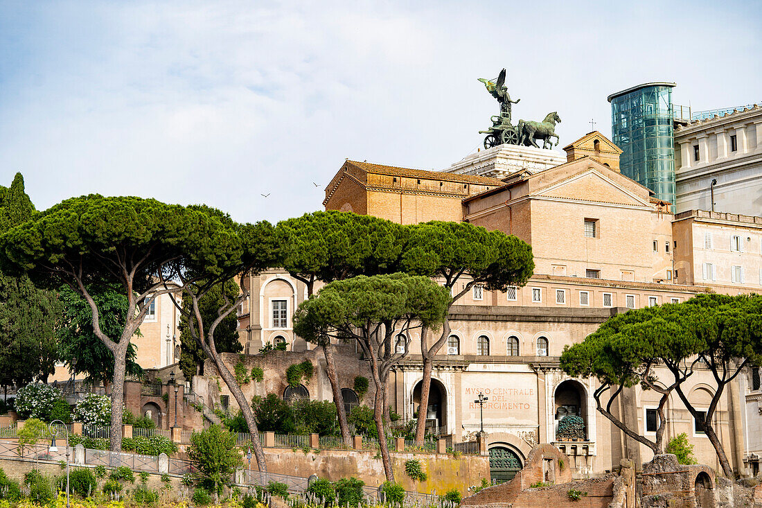 Vittoriano, Altar of the Fatherland, Victor Emmanuel Monument, Altare della Patria Piazza Venezia with the Goddess Victoria Statue on the rooftop; Rome, Italy