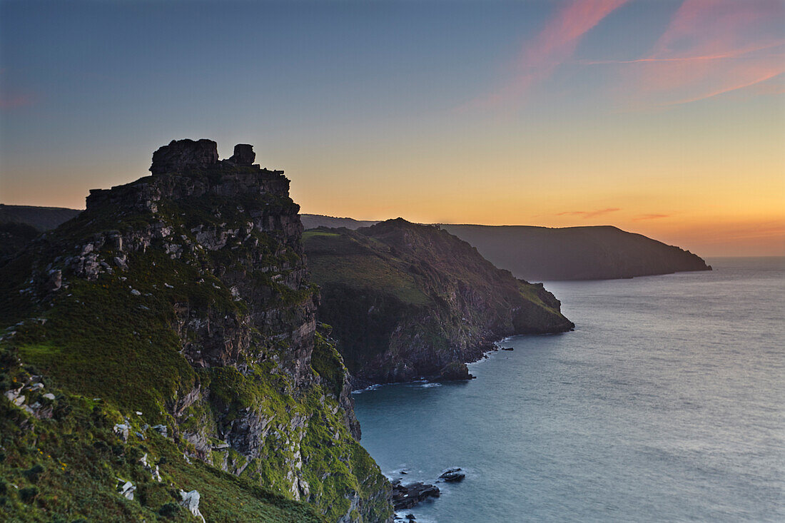 Sunset over cliffs at the Valley of Rocks, Lynton, Exmoor National Park; Devon, England, Great Britain