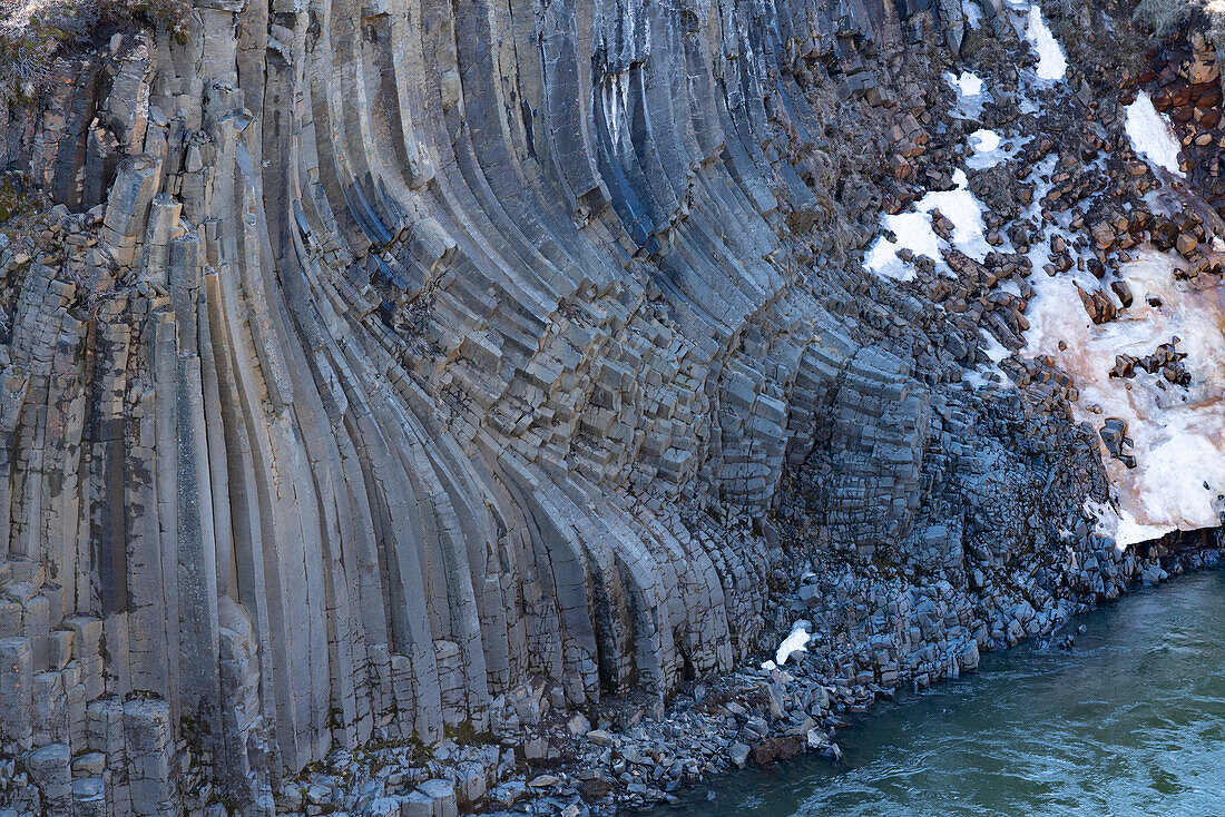 Close-up of the basalt columns of Stuðlagil Canyon in North Iceland, creating a surreal landscape; Stuðlagil Canyon, North Eastern Iceland, Iceland