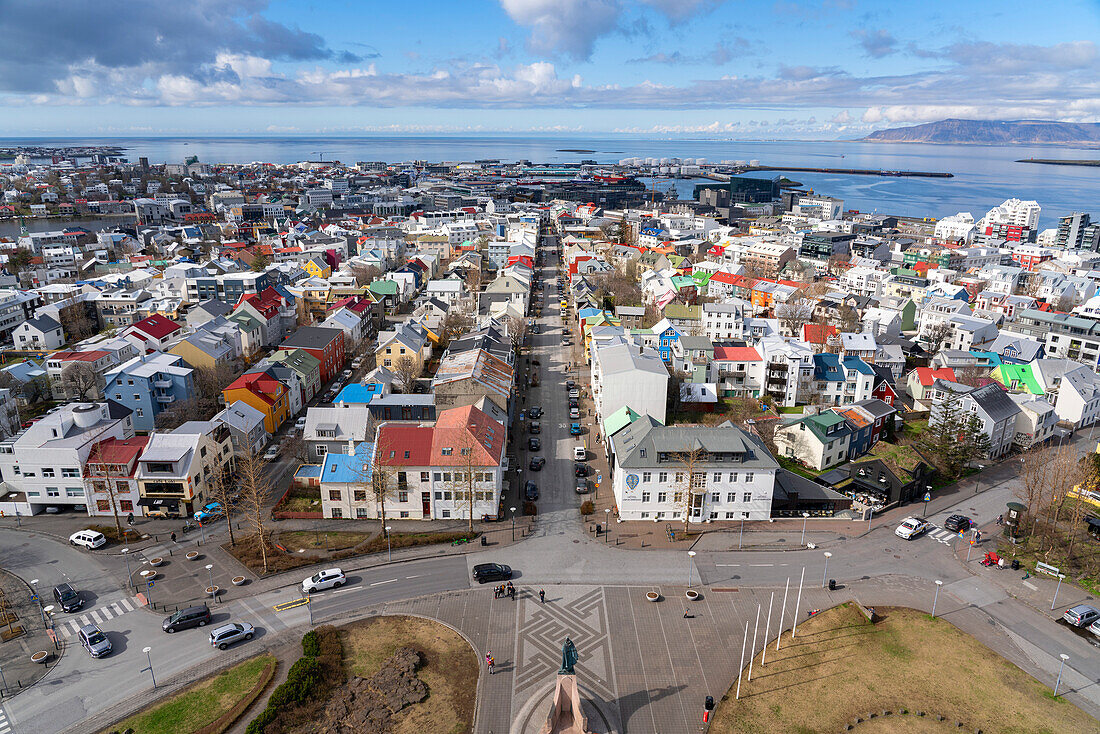 An aerial view of downtown Reykjavík as seen from the top of the church. The brightly colored houses create a beautiful effect; Reykjavík, Iceland