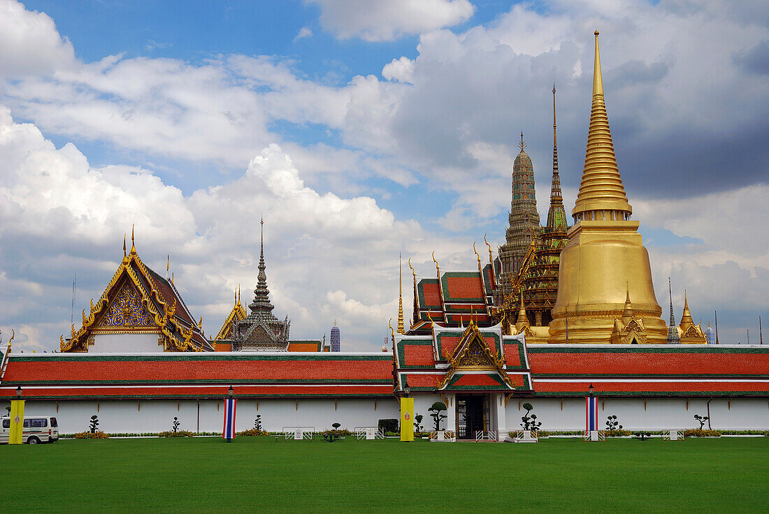 A cloud-filled sky over the Thai Grand Palace.; Grand Palace, Bangkok, Thailand.