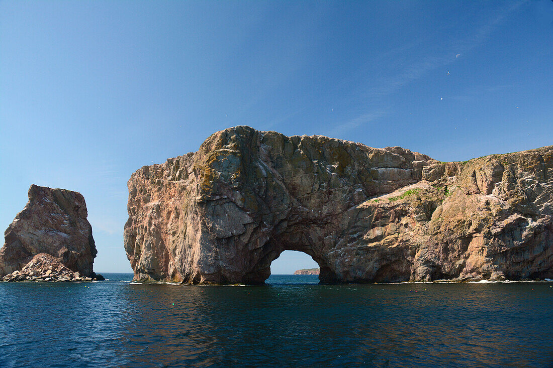 Perce Rock off the Gaspe Peninsula.; Ile Bonaventure et du Rocher Per, Quebec, Canada.