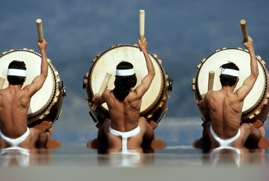 Japanese Kodo drummers in traditional costume; Sado Island, Japan