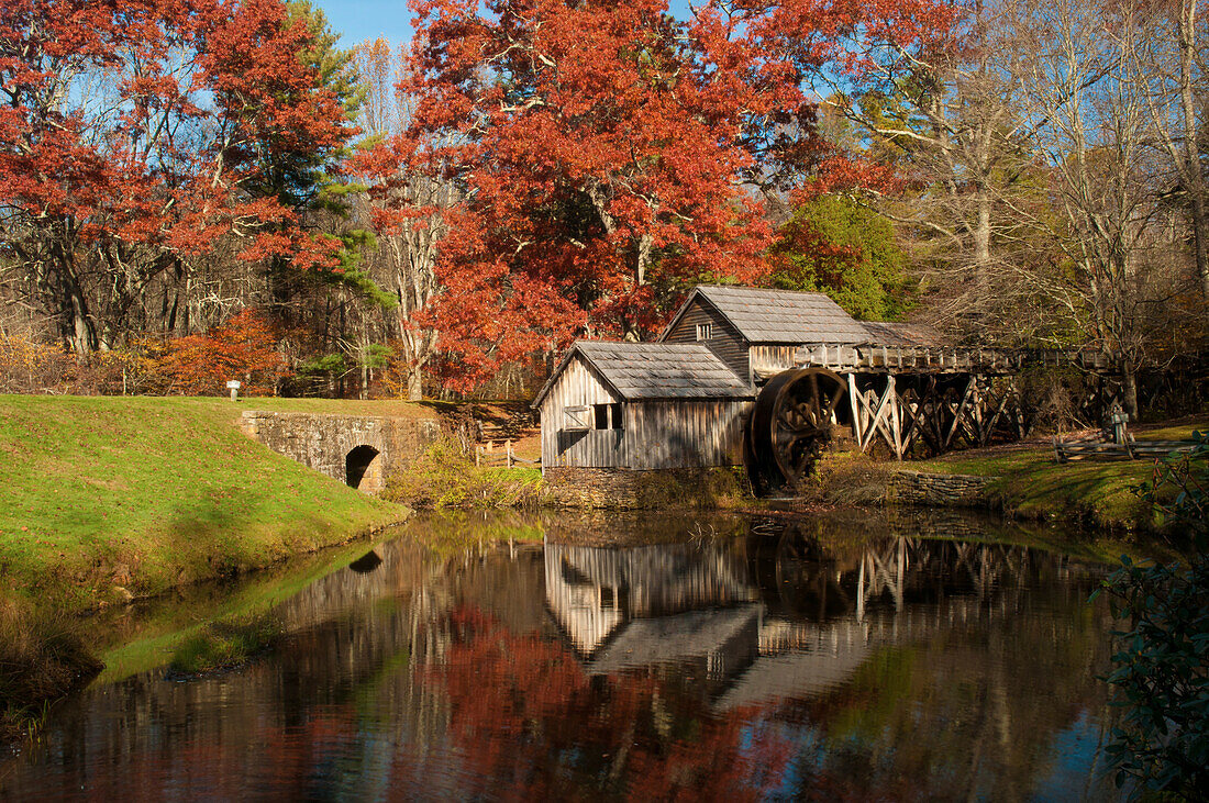 Mabry Mill and pond in autumn.; Mabry Mill, Meadows of Dan, Virginia.