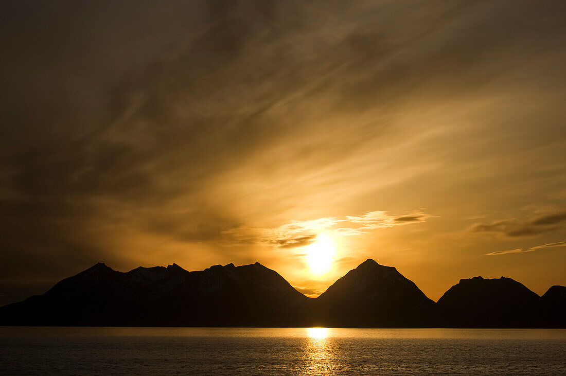 Mountains north of the Arctic Circle, land of the midnight sun; Norway