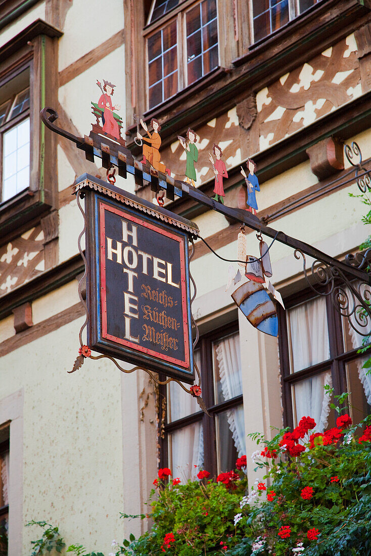 Sign For A Hotel Hanging From The Side Of A Building; Rothenburg Ob Der Tauber Bavaria Germany