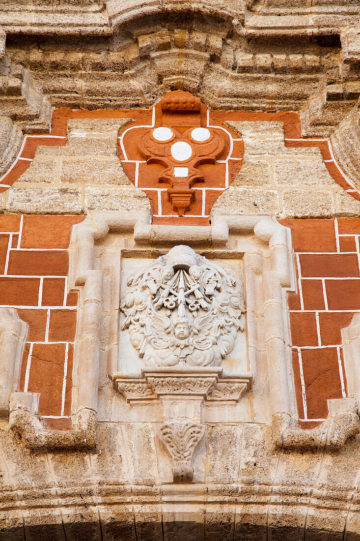 Ornate Design On A Brick Wall; San Fernando Andalusia Spain