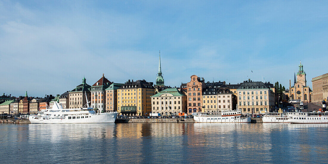 Boats Moored Along The Water's Edge; Stockholm Sweden