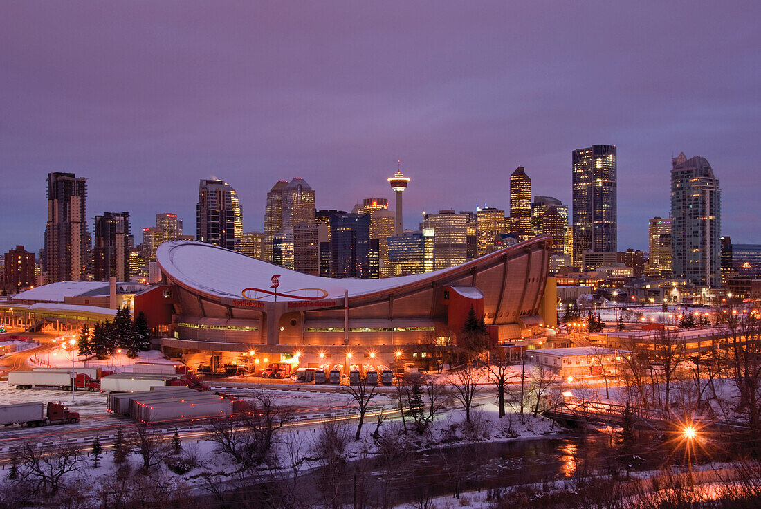 Winter Sunrise On The City Of Calgary And The Saddledome; Calgary Alberta Canada