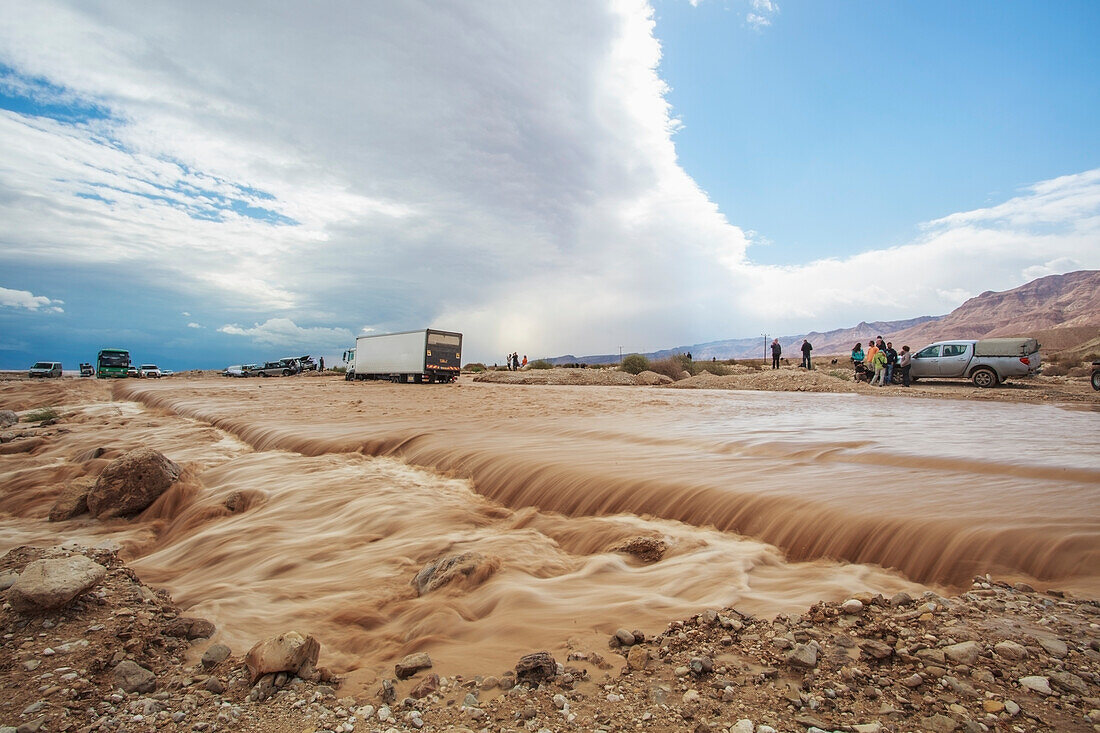 Water Flowing Over A Washed Out Road After A Flood; Jordan Valley Israel