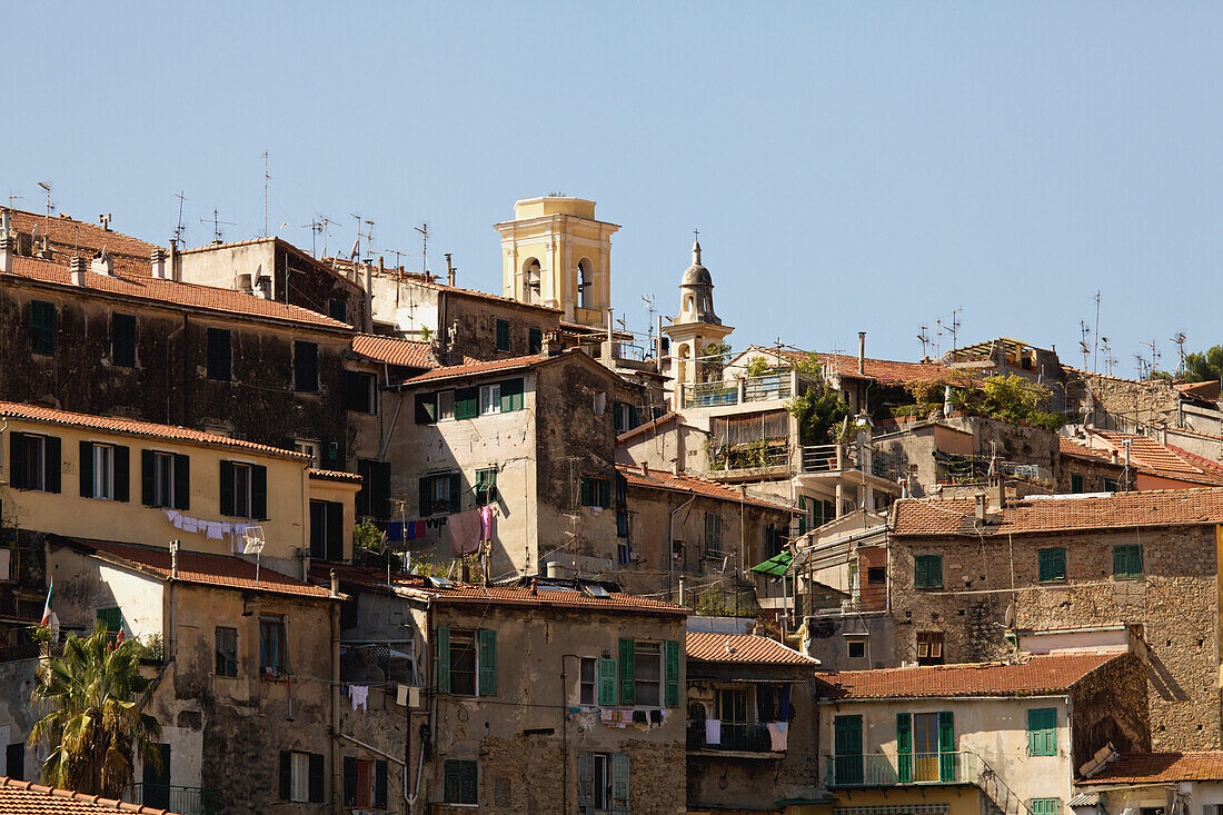 Residential Buildings Against A Blue Sky; Ventimiglia Italy