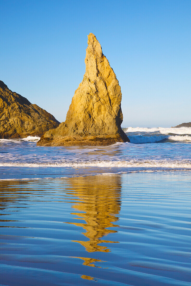 Rock Formations At Low Tide On Bandon Beach; Oregon, United States Of America