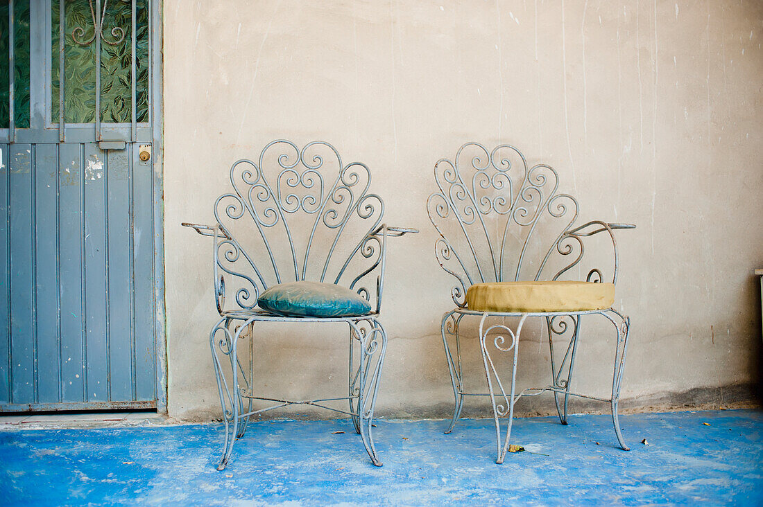 Two Chairs With Cushions Sitting Outside A Doorway; Yelapa, Jalisco, Mexico