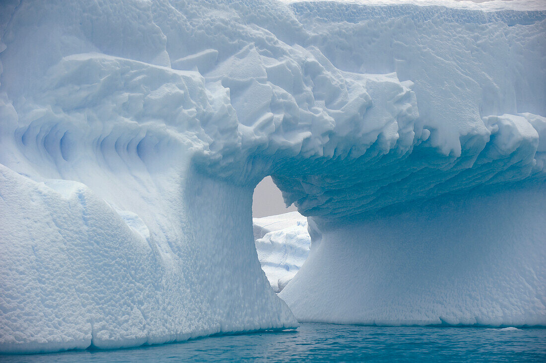 Iceberg With A Hole Through It; Antarctica