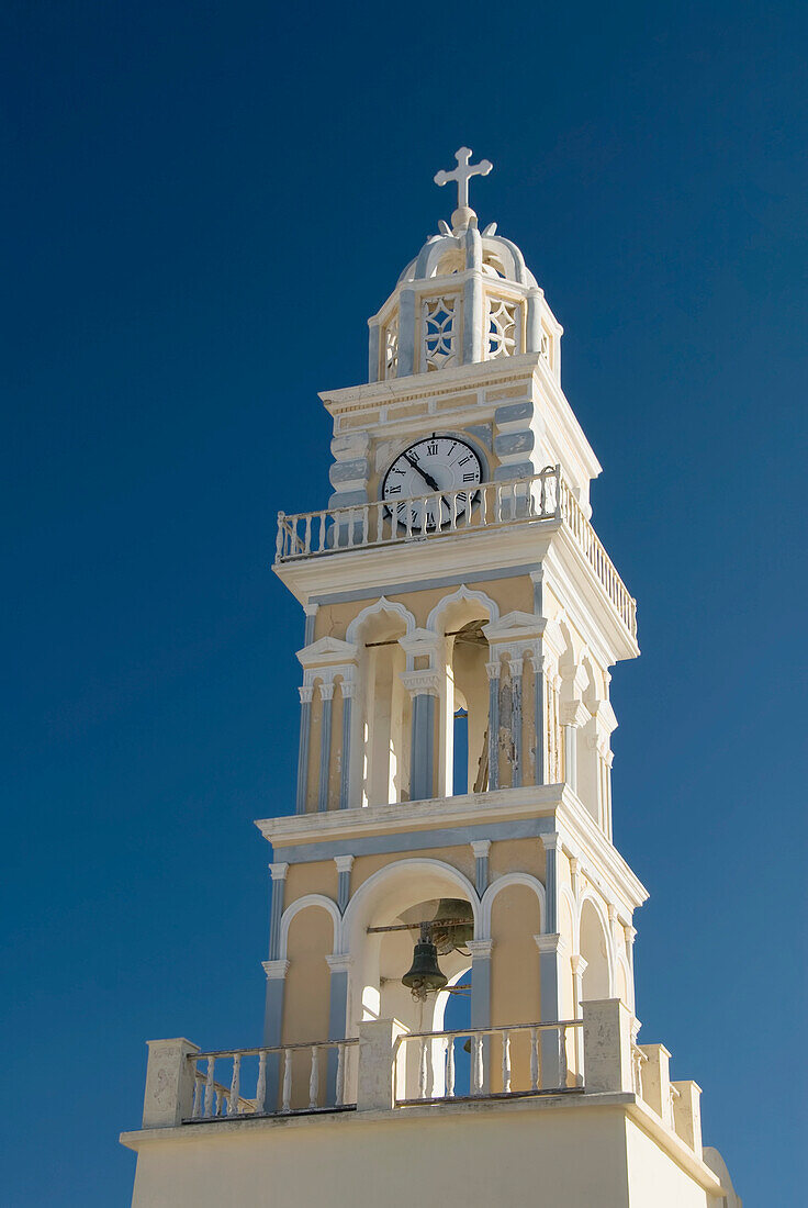Greece, Santorini, Fira, Architectural detail of a Catholic Cathedral Chrurch bell and clock tower.