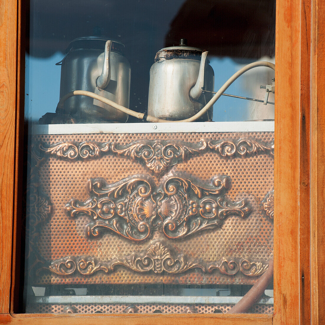 Metal Teapots Sitting Inside A Window; Ortahisar Nevsehir Turkey