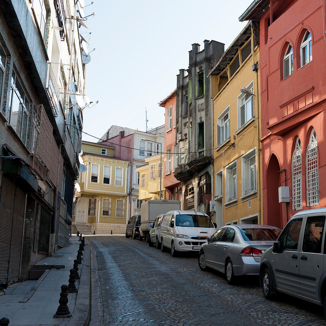 Colourful Buildings And Parked Cars Along A Street; Istanbul Turkey