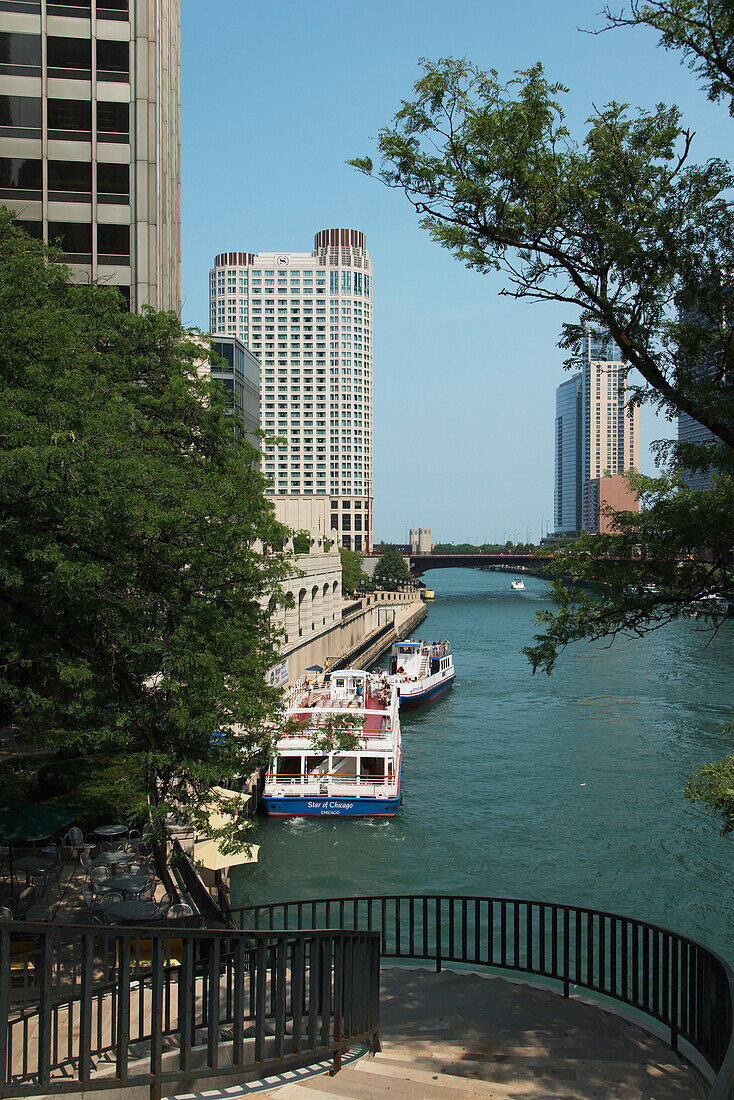 Buildings And Boats Along The Chicago River; Chicago Illinois United States Of America
