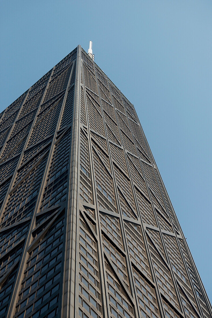 Low Angle View Of The John Hancock Centre Against A Blue Sky; Chicago Illinois United States Of America