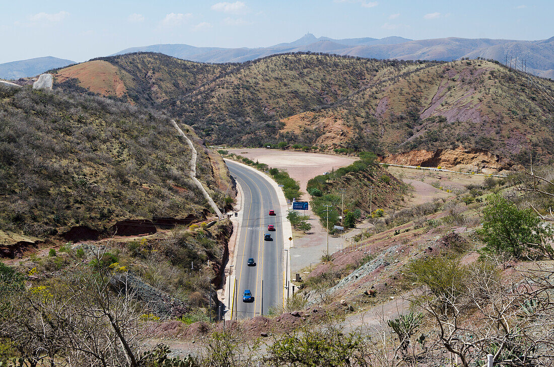 Mexico, Guanajuato State, Guanajuato, Highway at entrance of Guanajuato surrounded by mountains