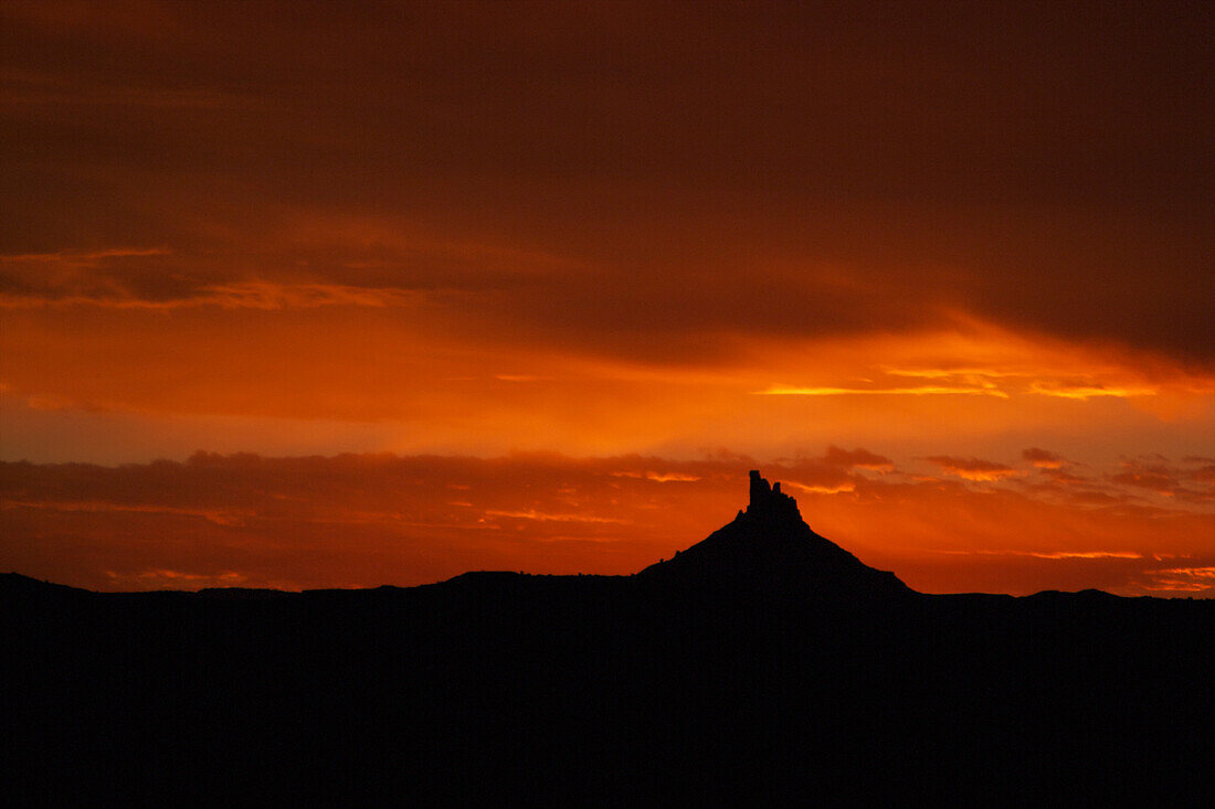 North Six Shooter desert tower at sunset; Indian Creek, Utah, USA
