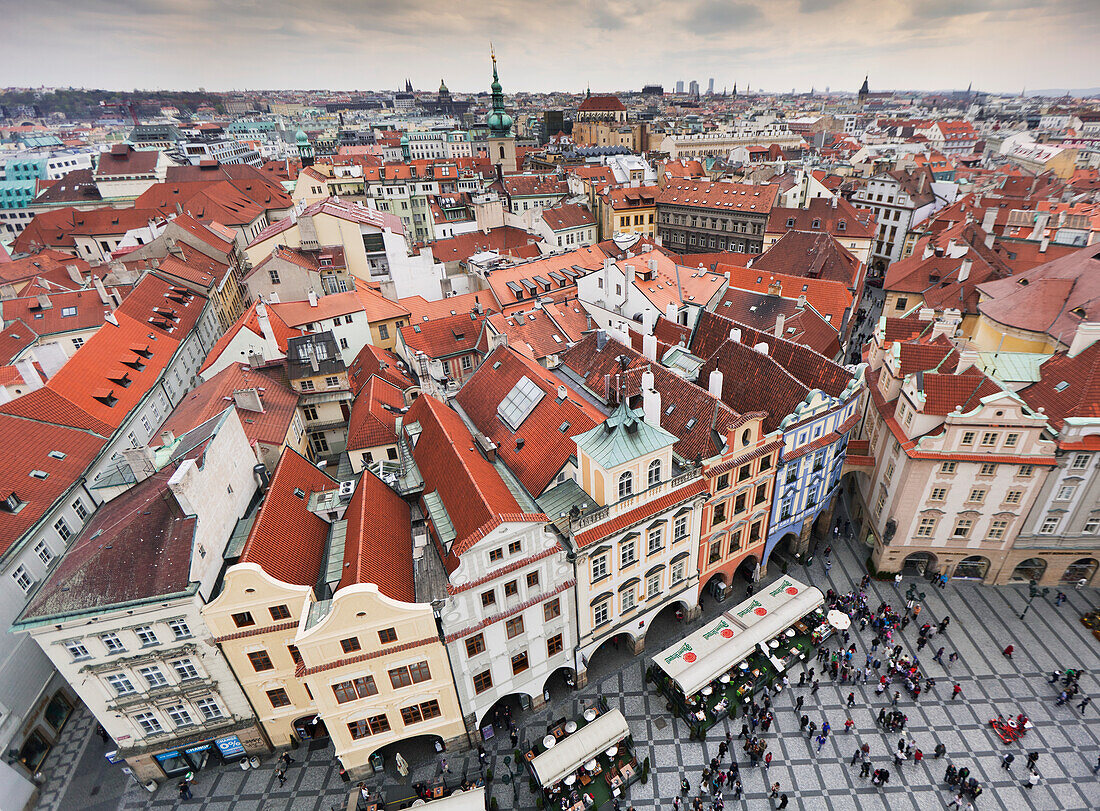 Czech Republic, High angle view of cityscape and people in town square; Prague