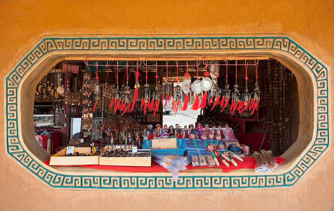 Thailand, Chiang Mai, Display of souvenirs on window sill; Shandicun