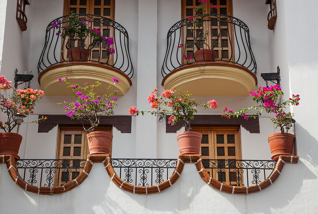 Mexico, Wrought iron decorations and flower pots; Puerto Vallarta