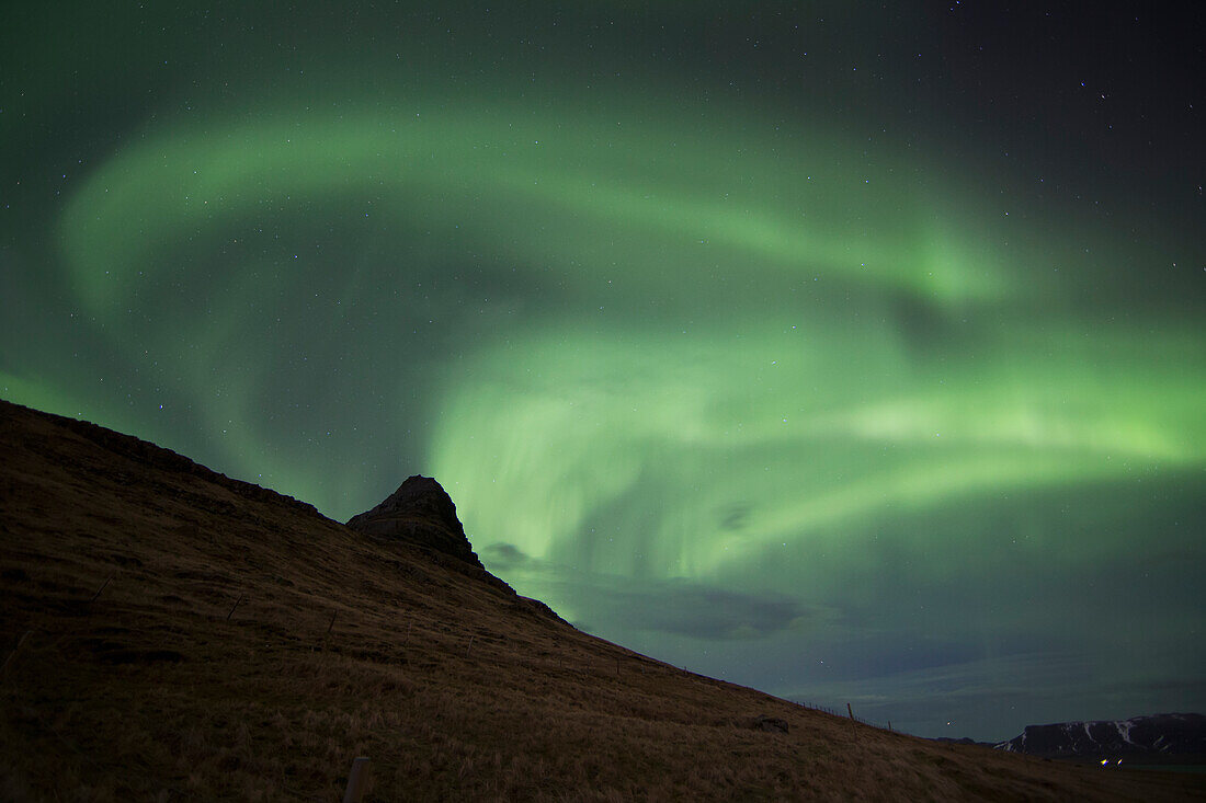 Northern Lights (Aurora Borealis) Over Kirkjufell In The Town Of Grundarfjorthur, Snaefellsness Peninsula; Grundarfjorthur, Iceland