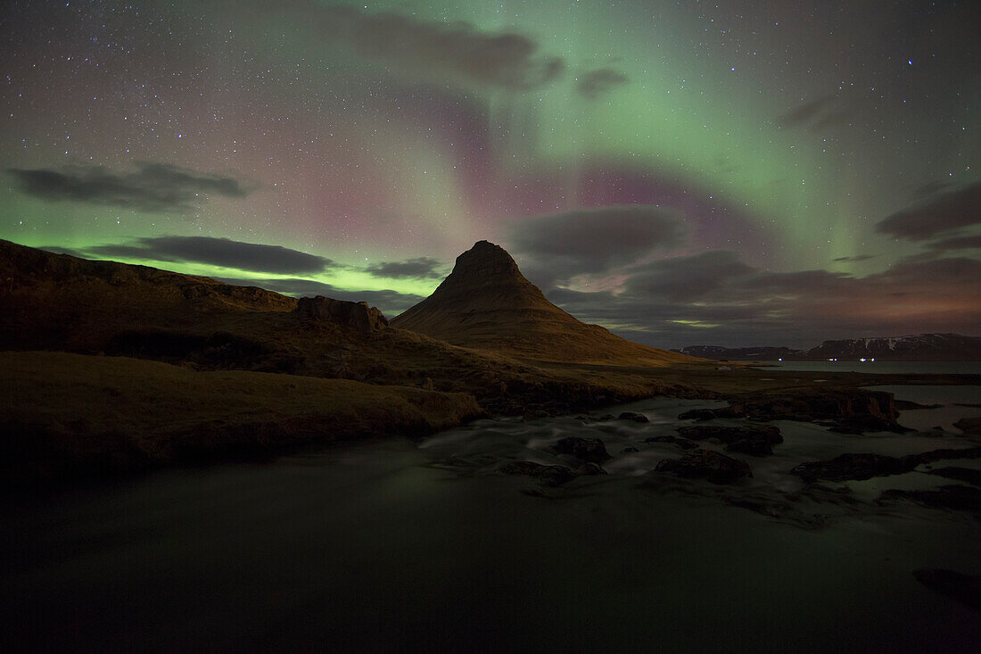 Northern Lights Or Aurora Borealis Over Kirkjufell In The Town Of Grundarfjorthur, Snaefellsness Peninsula; Grundarfjorthur, Snaefellsness, Iceland