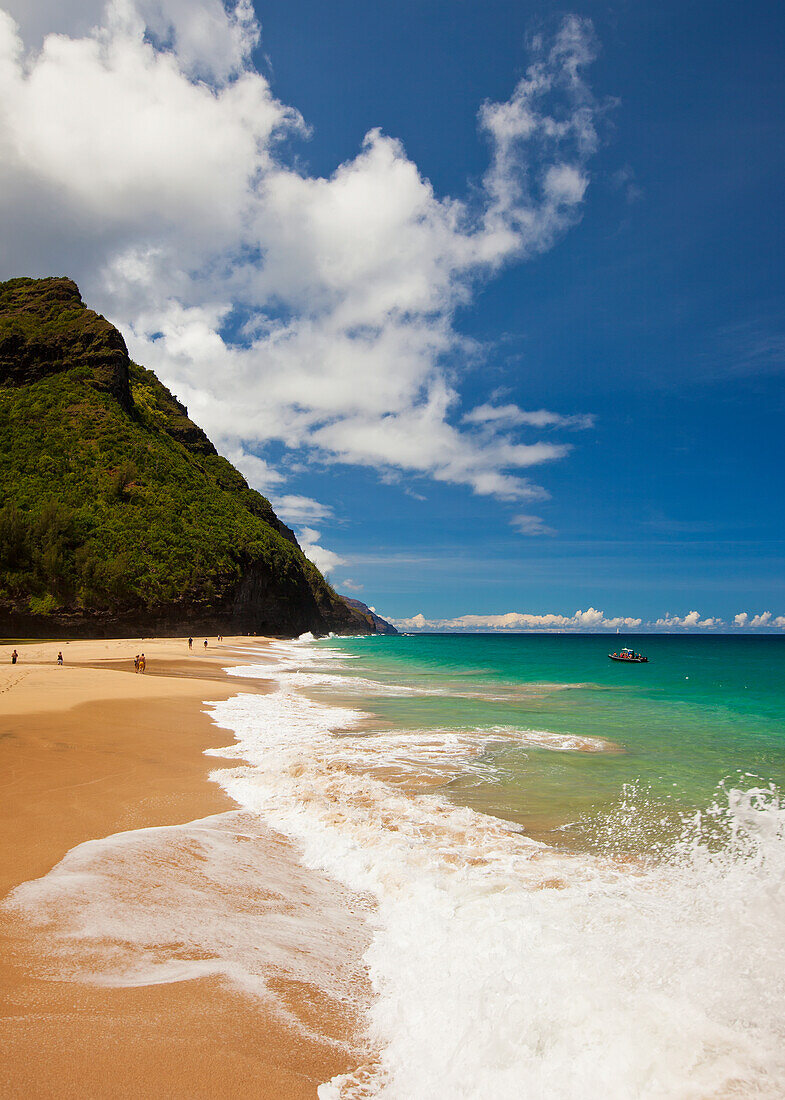 Waves Splash On This Beach Along The Kalalau Trail And Part Of The Napali Coast; Kauai, Hawaii, United States Of America