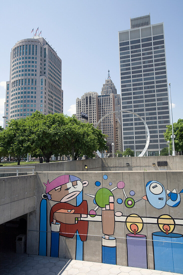 Colourful Mural Painted On A Concrete Wall With Skyscrapers In The Background In Downtown Detroit; Detroit, Michigan, United States Of America