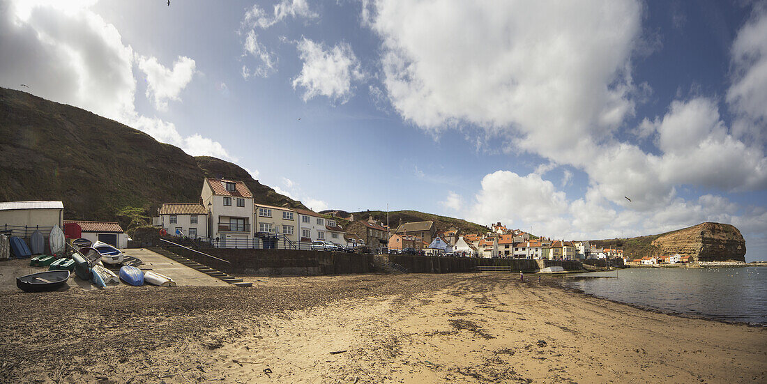 Houses And Cliffs Along The Coastline; Staithes, Yorkshire, England
