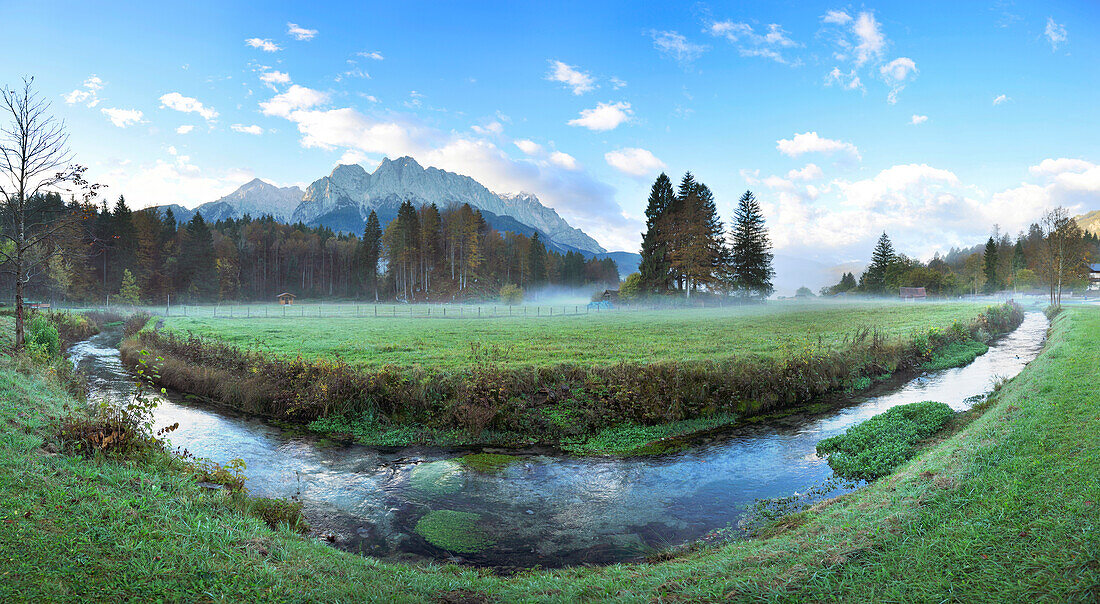 Landscape of the highest Mountain in Germany (Zugspitze) in the distance, on an early morning in autumn, view from Tirol, Austria