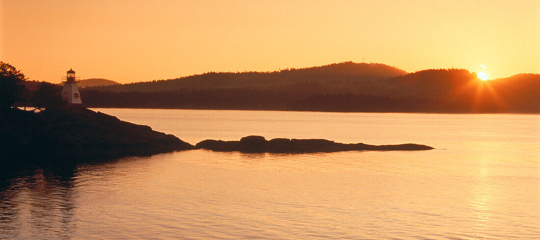 Lighthouse and Water at Sunset British Columbia, Canada