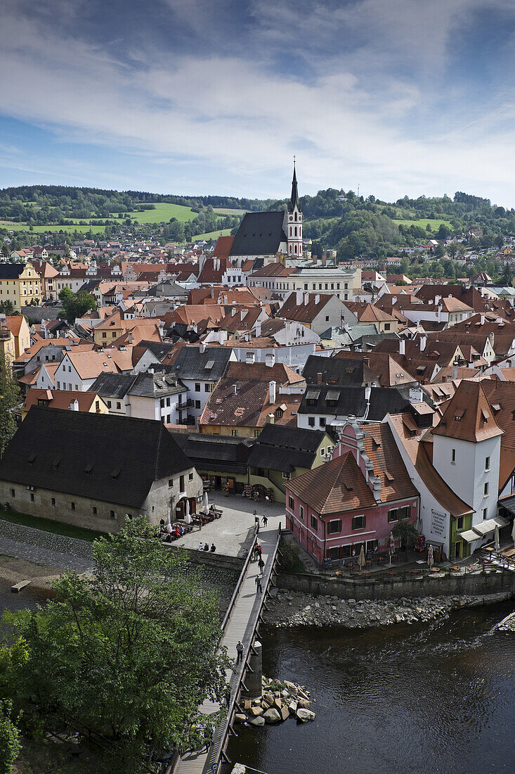 Scenic overview of Cesky Krumlov with Church of St Vitus in the background, Czech Republic.