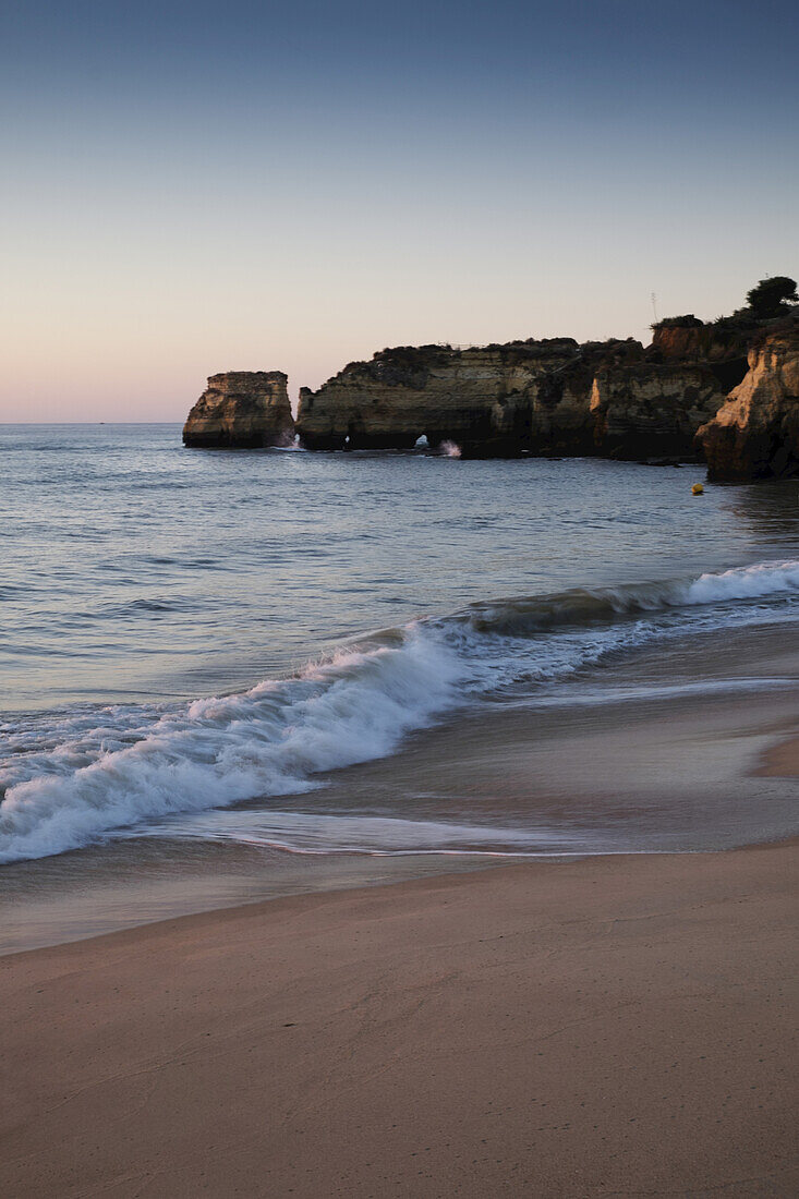 Waves hitting Beach at Lagos, Algarve Coast, Portugal
