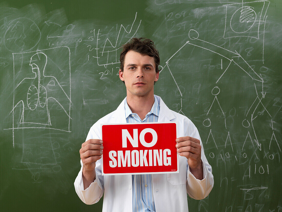 Scientist Holding No Smoking Sign