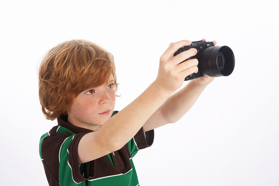 Boy Holding Camera