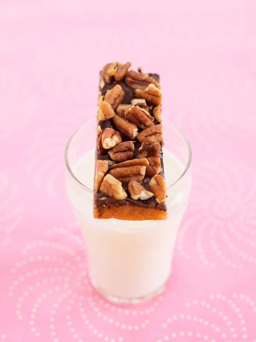 Toffee Bar on top of Glass of Milk