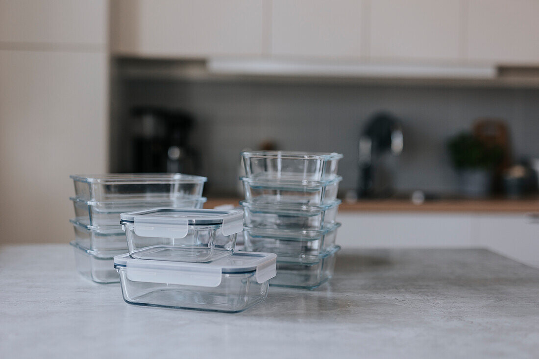 Glass containers on kitchen worktop