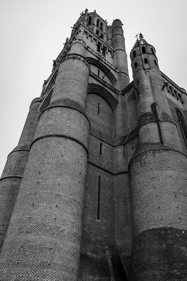 The Cathedral Basilica of Saint Cecilia, a 13th century cathedral in the French Gothic style, low angle view of the tall towers. 