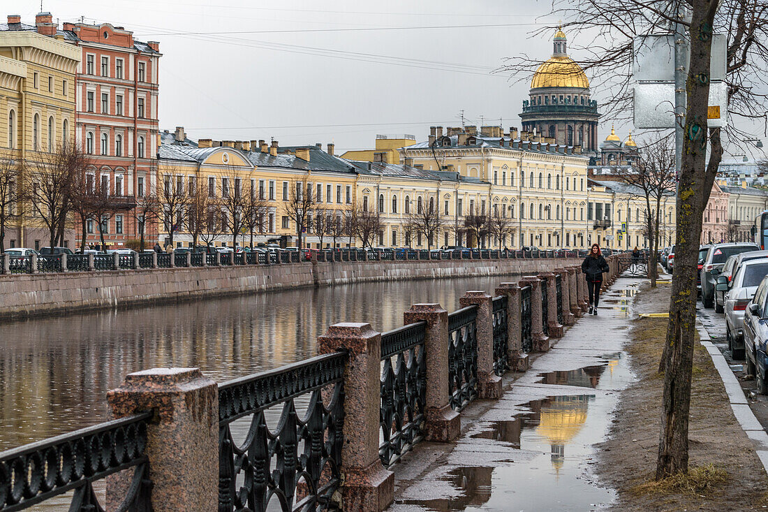 Moika Embankment, the Mokya River, 18th century houses along the water front and St Isaac's cathedral. 