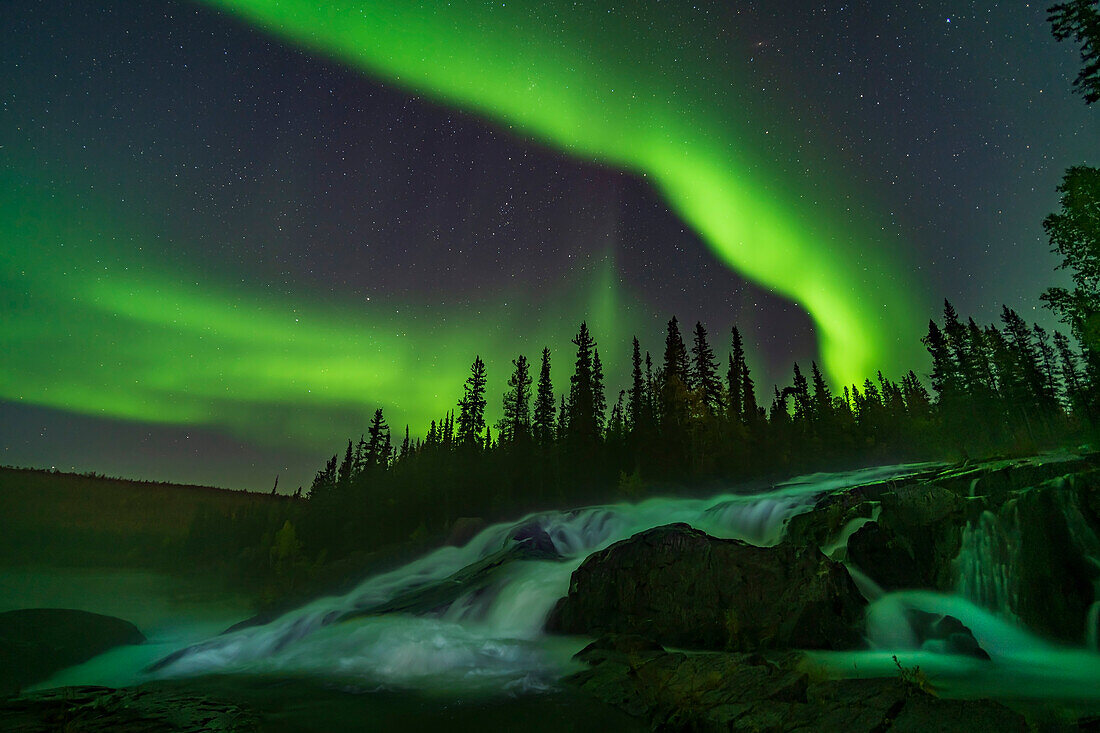 Curtains of aurora over the Ramparts falls on the Cameron River near Yellowknife, NWT, on Sept 8, 2019.