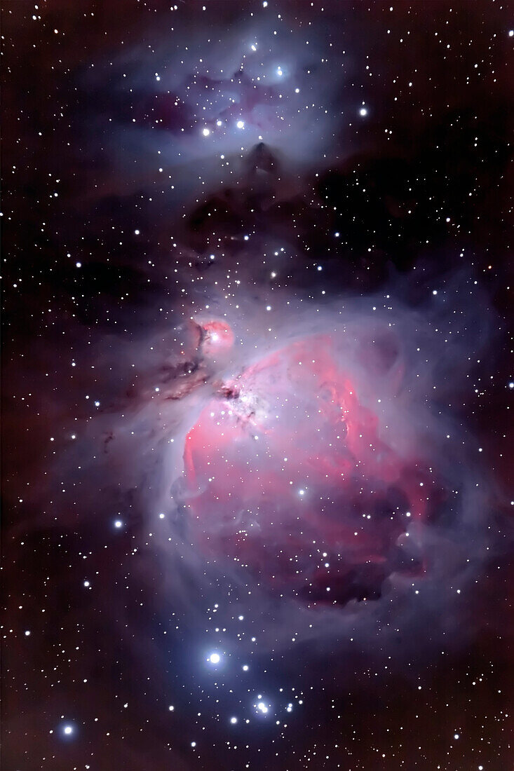 Orion Nebula region with NGC1973-7. Stack of two 10-minute exposures + stack of 30s and 1min exposure for retaining bright core deail. Blended with Normal @ 85% but erasing all of short exposure layer except for core.