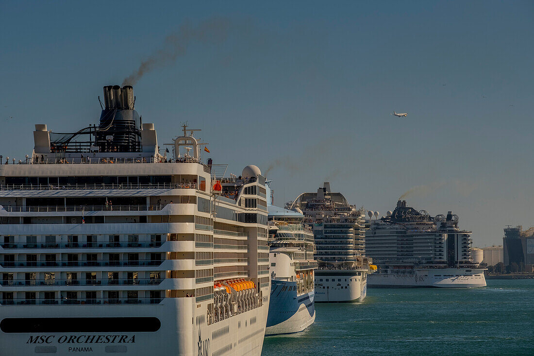 Cruise ship in the port of Barcelona expelling smoke, Barcelona, Spain